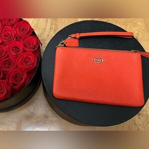 Coach Orange/Red Leather Wristlet